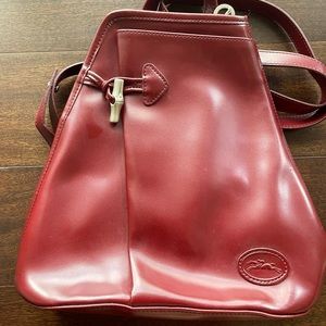 Longchamp burgundy leather backpack. VG used cond